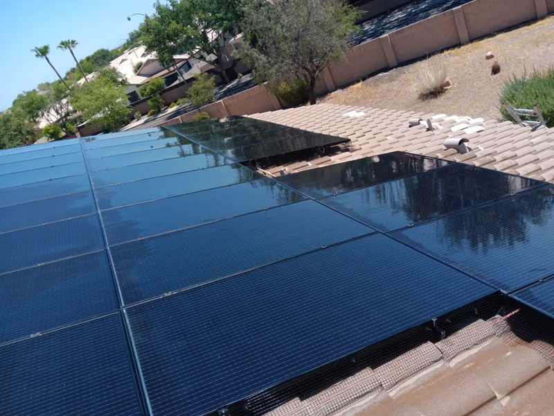 Completed solar panel reset on a tile roof in Peoria, Arizona