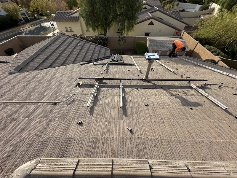 Solar Detach and Reset crew detaching panels on a Buckeye, Arizona tile roof