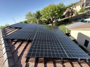 Solar panels reset and reinstalled after roof replacement to maintain warranty.