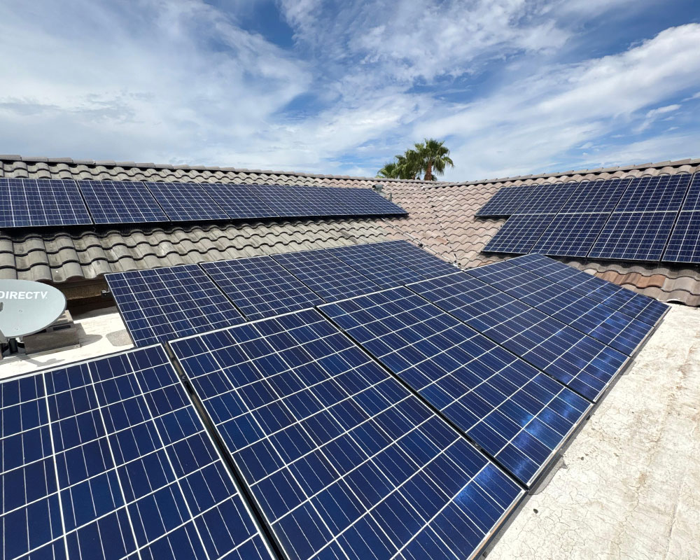 Solar panels installed on a tiled roof in Arizona, showcasing a clean and efficient solar energy setup, emphasizing the importance of roof integrity and manufacturer-approved repairs.
